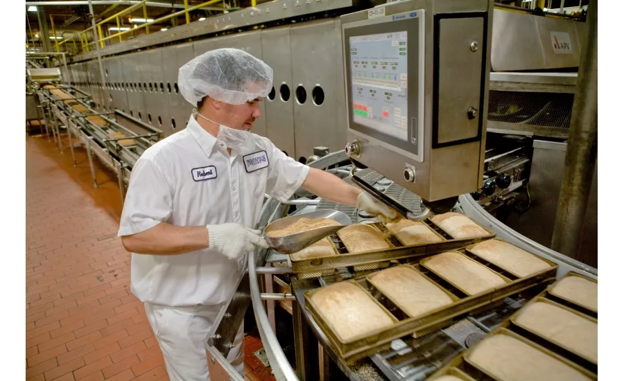 A worker works on the assembly line. Courtesy of: ABA