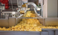potato chips on a conveyor