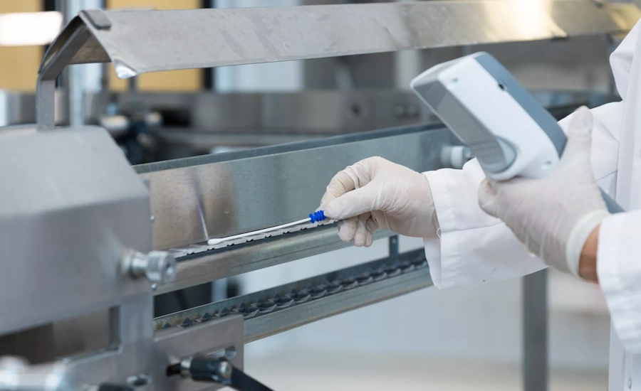 Image of person conducting a food safety inspection with a cotton swab