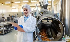 person on clipboard in processing environment