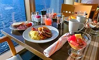 Cruise Ship Buffet Dining Area Cruise ship buffet dining area with serving stations and ocean views.