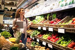 Woman shopping for fresh produce