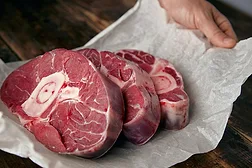 Beef shanks in paper wrapping