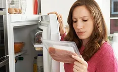woman holding packaged food
