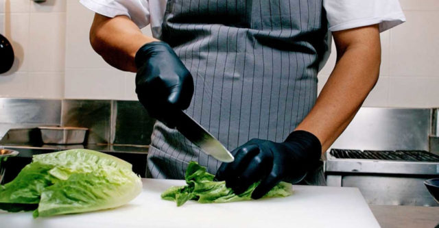 chef slicing lettuce