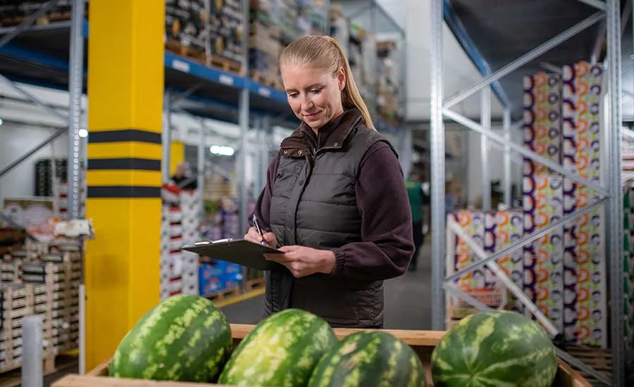 woman inspecting food