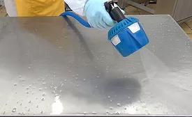 man cleaning table