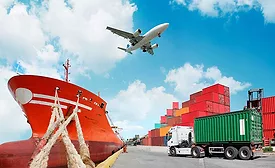 plane flying over ship and containers