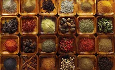 The image displays a variety of whole and ground spices, commonly used in Indian cuisine The image displays a variety of whole and ground spices, commonly used in Indian cuisine