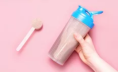 protein powder and a shaker bottle. protein powder and a shaker bottle.