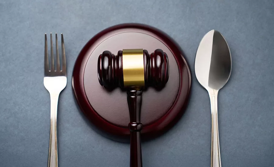 a gavel, which is a small mallet typically used by a judge, an auctioneer, or a presiding officer of a meeting. a gavel, which is a small mallet typically used by a judge, an auctioneer, or a presiding officer of a meeting.