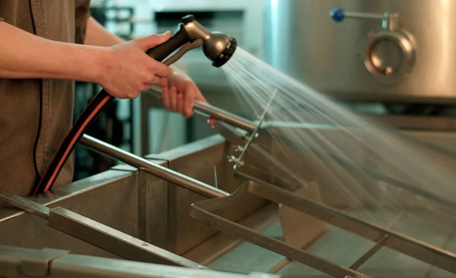 person washing equipment