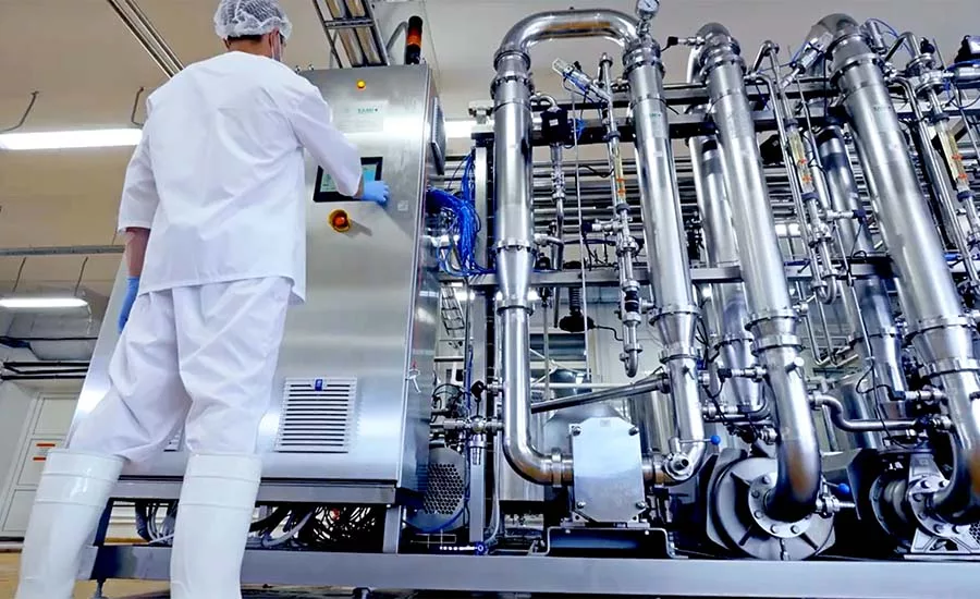 This image shows a food-grade industrial processing system, likely used in a high-tech facility such as for cultivated meat production.