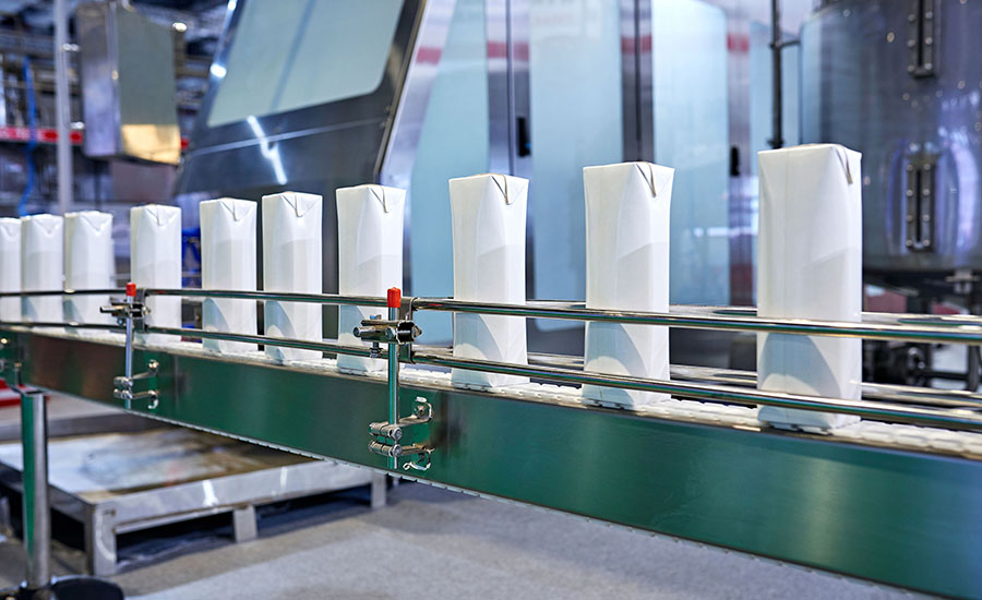  factory conveyor belt processing white beverage cartons