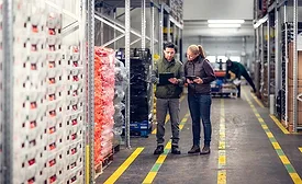 Warehouse workers taking inventory