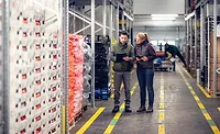 Warehouse workers taking inventory Warehouse workers taking inventory