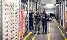 Warehouse workers taking inventory