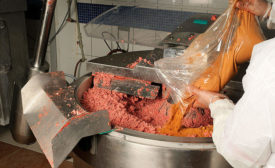 A process mixes ingredients into meat