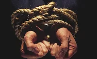 Hands Tied Together with Rope