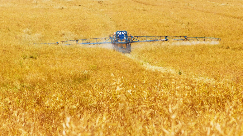 crops being sprayed with chemicals