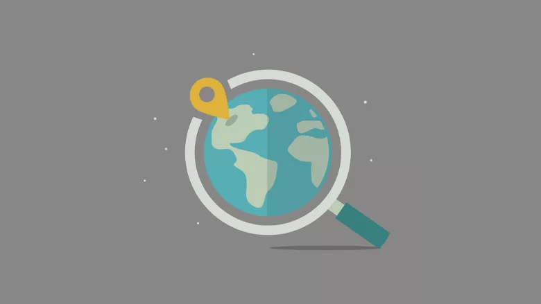 globe under magnifying glass