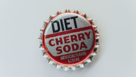 bottle cap that says "diet cherry soda: artificial sweetener and flavoring"