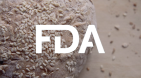 bun with sesame seeds on it and FDA logo overlay
