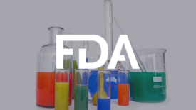 chemicals in beakers fda logo overlay