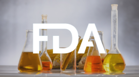 corn and chemical beakers with fda logo overlay