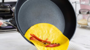 egg sliding out of nonstick pan