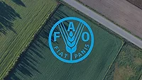 farm aerial view with FAO logo overlay