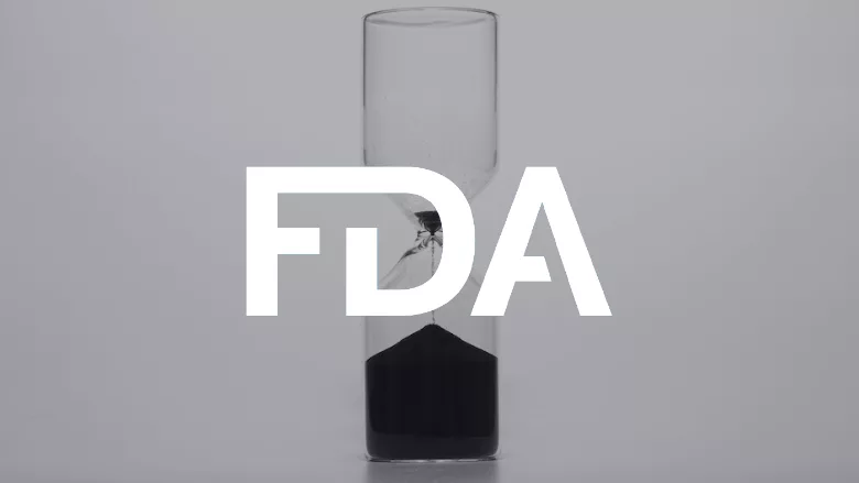 hourglass with an fda logo overlay