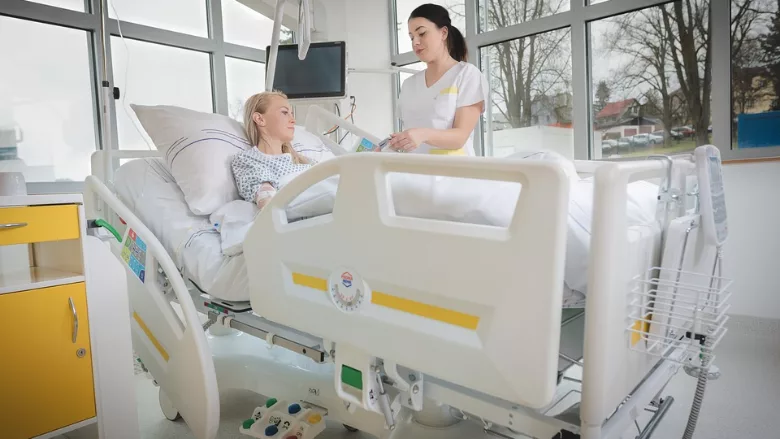 nurse caring for a patient in a hospital