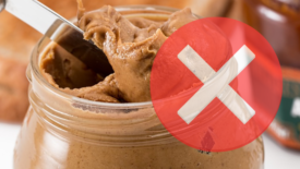 Red "X" over a jar of peanut butter