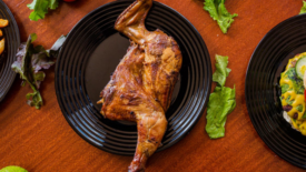 rotisserie chicken leg on plate