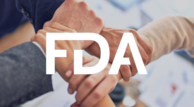 team joining hands with fda logo overlay