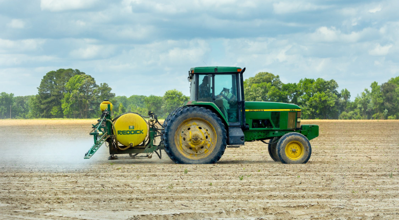 tractor spraying chemicals