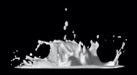 white milk splash against black background