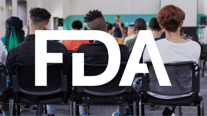 adults learning at conference fda logo overlay