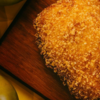 breaded chicken product on cutting board
