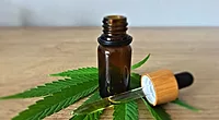 cbd oil bottle and dropper