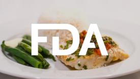 cod dinner with rice and beans. fda logo overlay