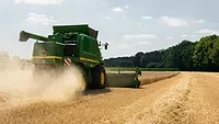 combine harvester on a wheat field combine harvester on a wheat field