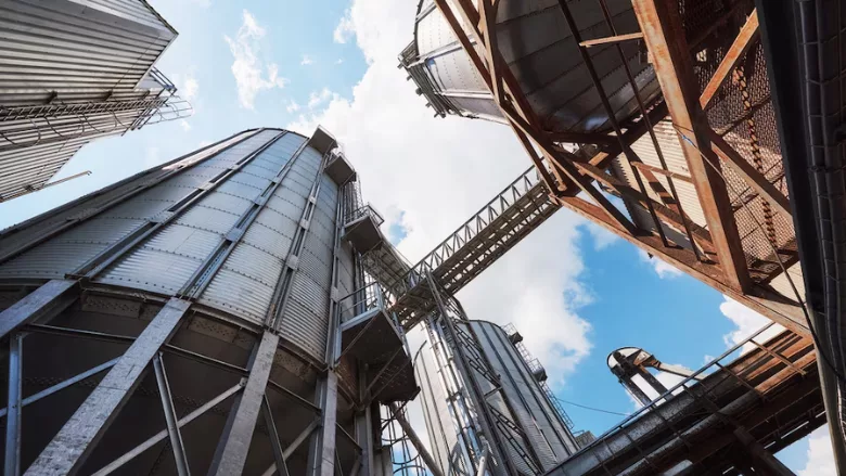 ground-up view of industrial or agricultural silos