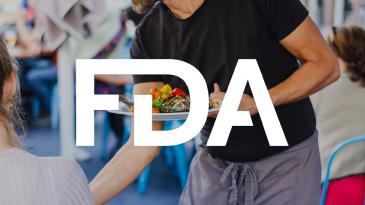 waiter serving food FDA logo overlay