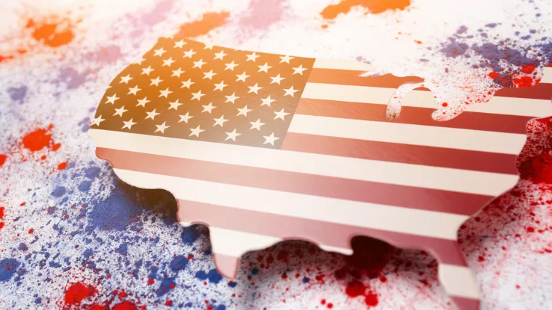 3D art of U.S. outline filled in with flag hovering over surface with blue and red paint splatter