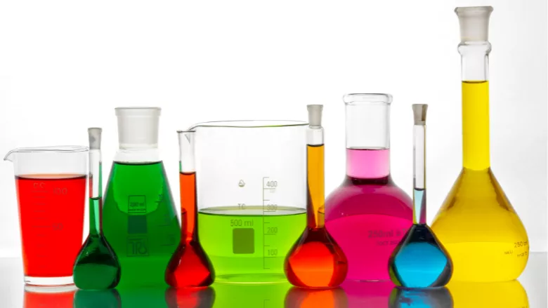 beakers filled with colorful liquids