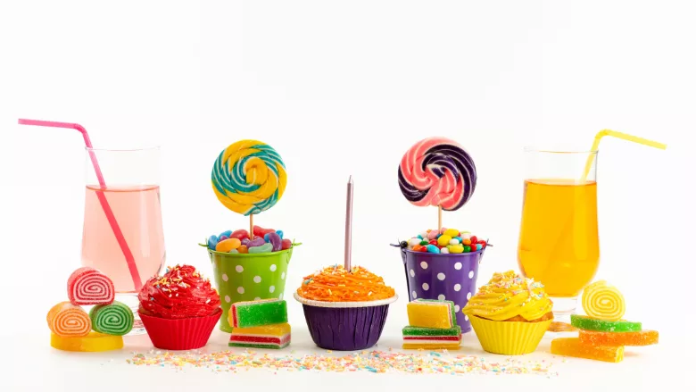 brightly colored candy cakes drinks