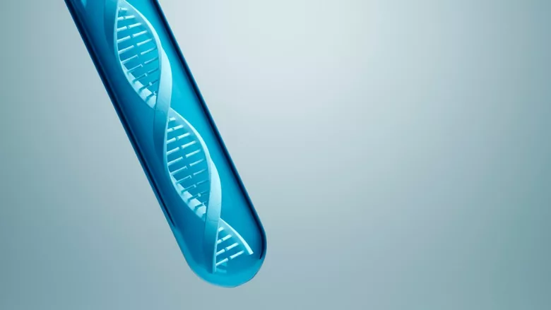 digital illustration of a dna strand within a test tube
