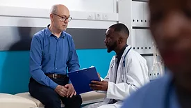 doctor talking to patient